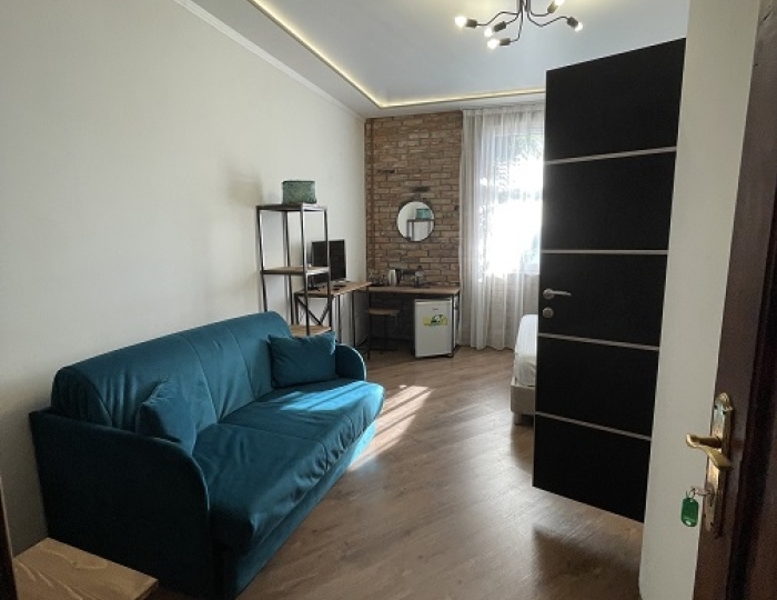 Комфорт 2-местный 1-комнатный 1-2 этаж, с кирпичной стеной - Гостиница «Абхазия» Новый Афон